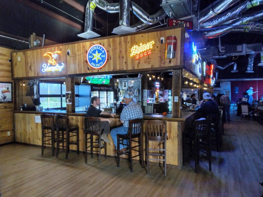 The bar and seating inside The 156