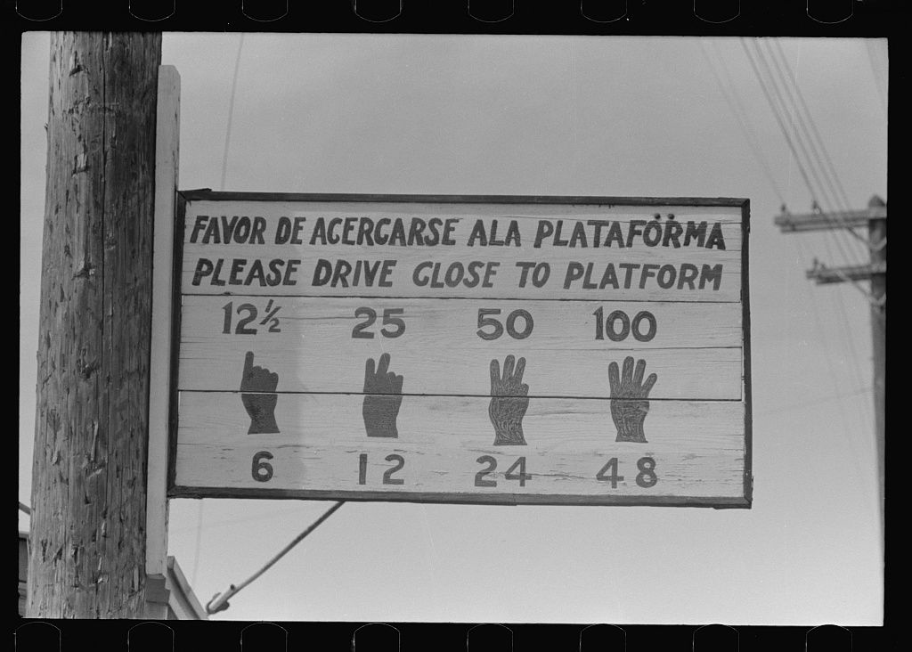 Sign in front of icehouse, Crystal City, Texas Sign in front of icehouse, Crystal City, Texas, March 1939, photographed by Russell Lee