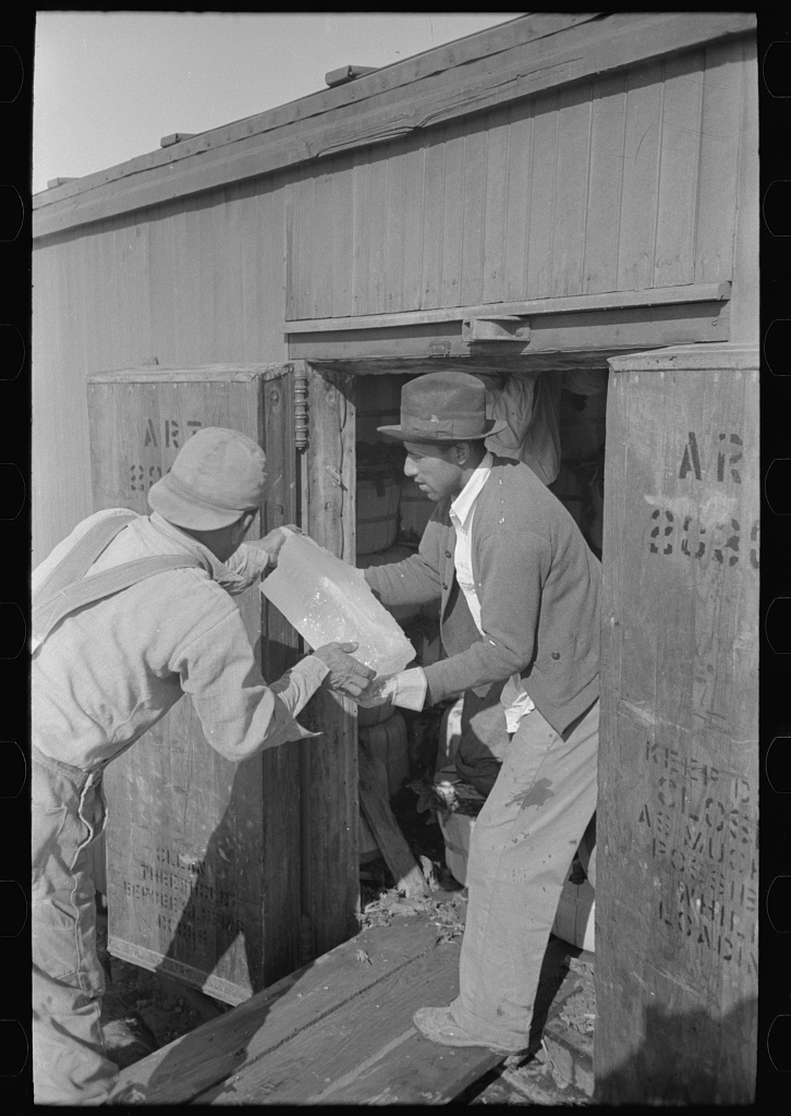 Icing refrigerator car, La Pryor, Texas Icing refrigerator car, La Pryor, Texas, March 1939, photographed by Russell Lee